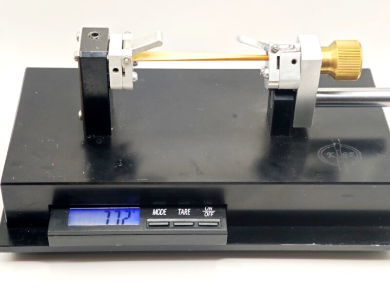 Testing oboe cane flexibility with a KGE Flexibility Tester