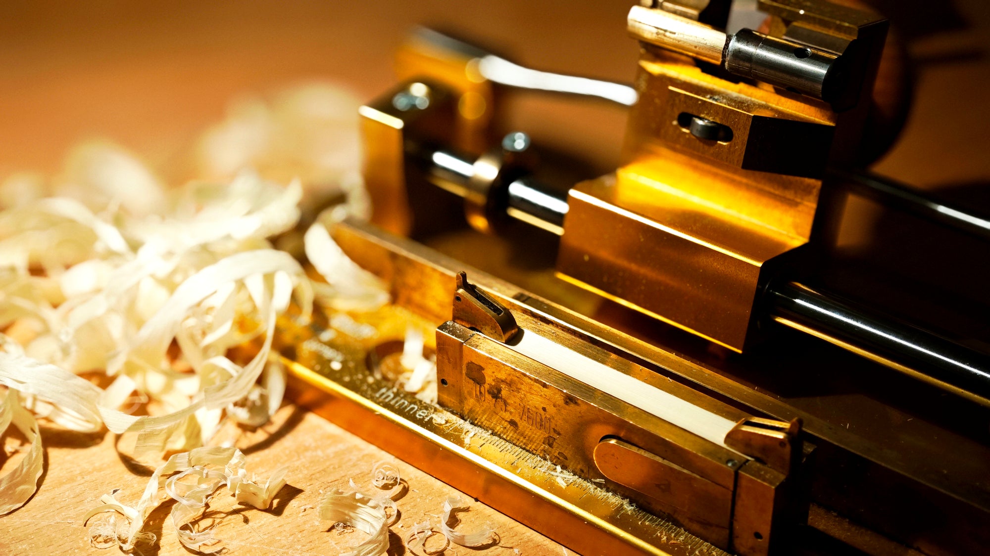 Oboe cane being gouged on a precision gouging machine