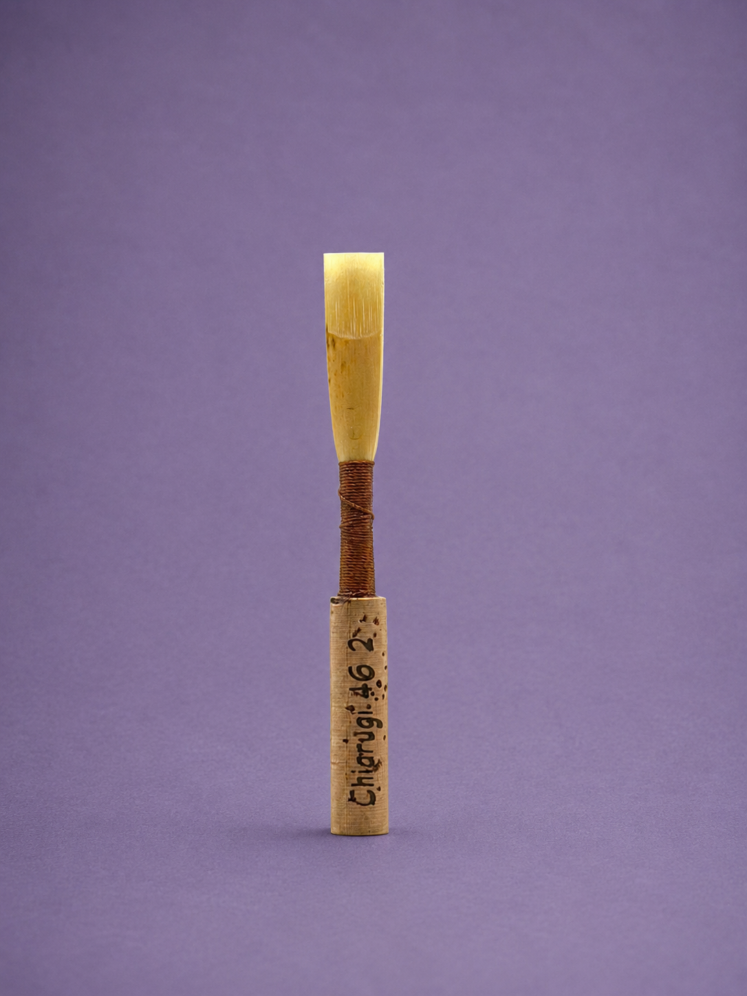 Handmade oboe reed on a Chiarugi staple
