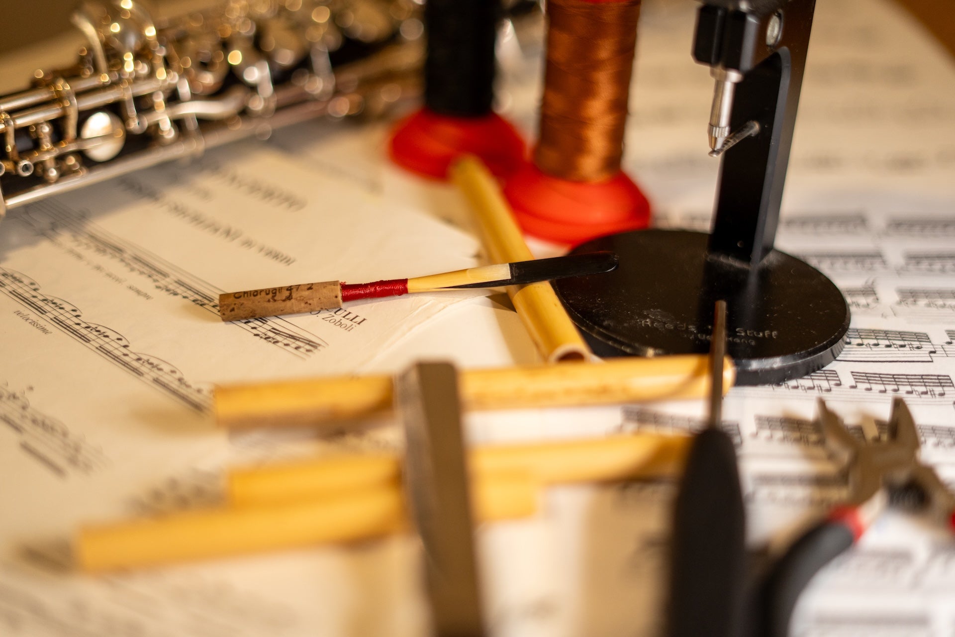 Handmade oboe reed making process with selected cane and reed tools