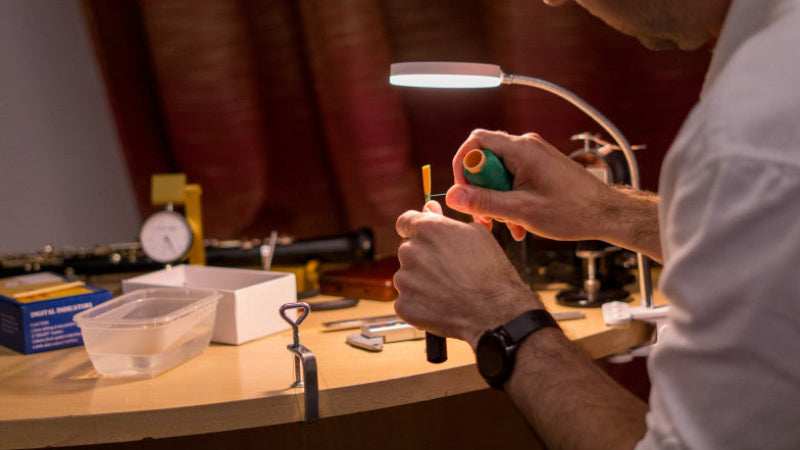 Handmade oboe reed making process at the reed making bench