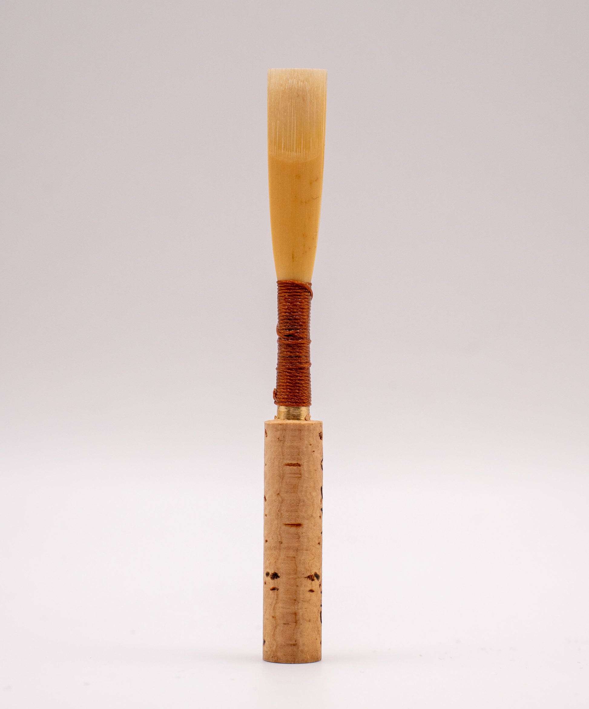 Professional oboe reed with French scrape – front view