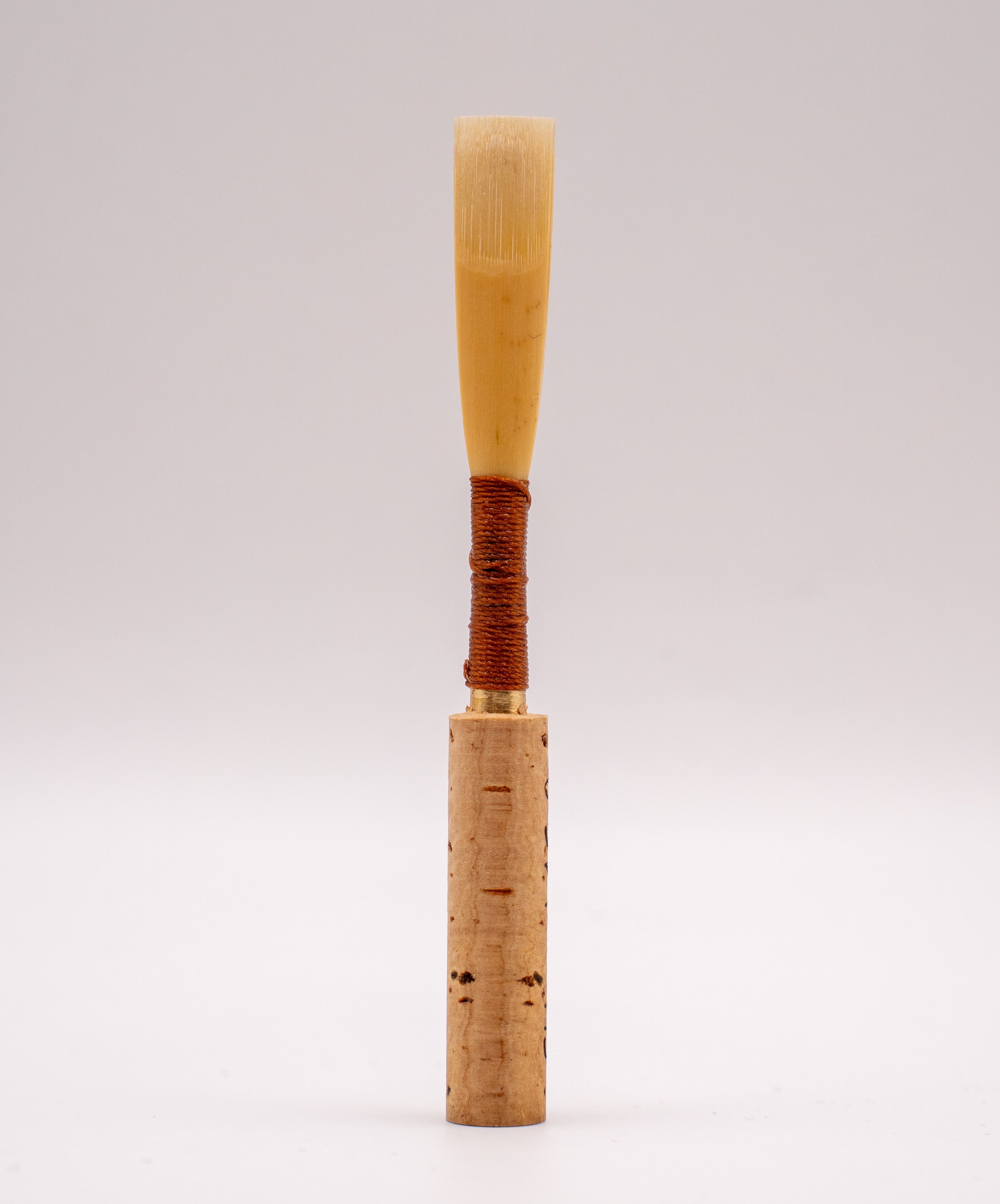 Professional oboe reed with French scrape – front view